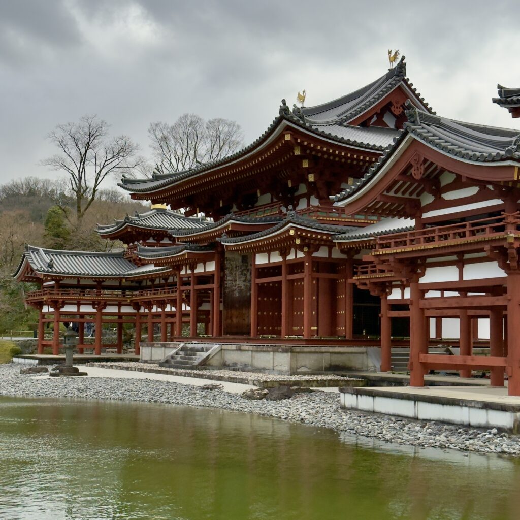 The 11th-century Phoenix Hall at Byodo-in Temple reflected in the pond, UNESCO World Heritage Site in Uji, Kyoto, Japan