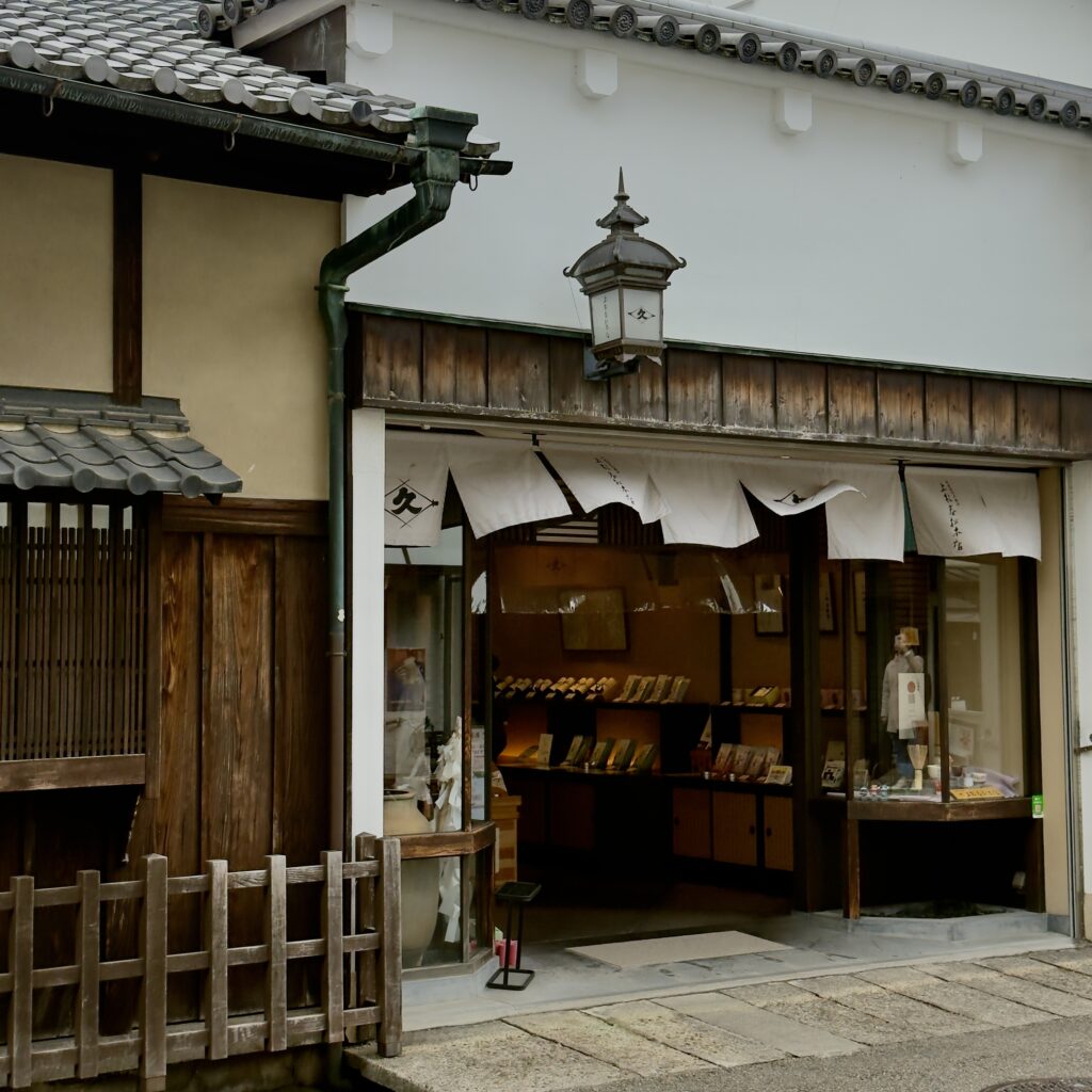 Ceremonial grade matcha preparation at Kanbayashi Shunsho tea merchant in Uji, Kyoto, Japan