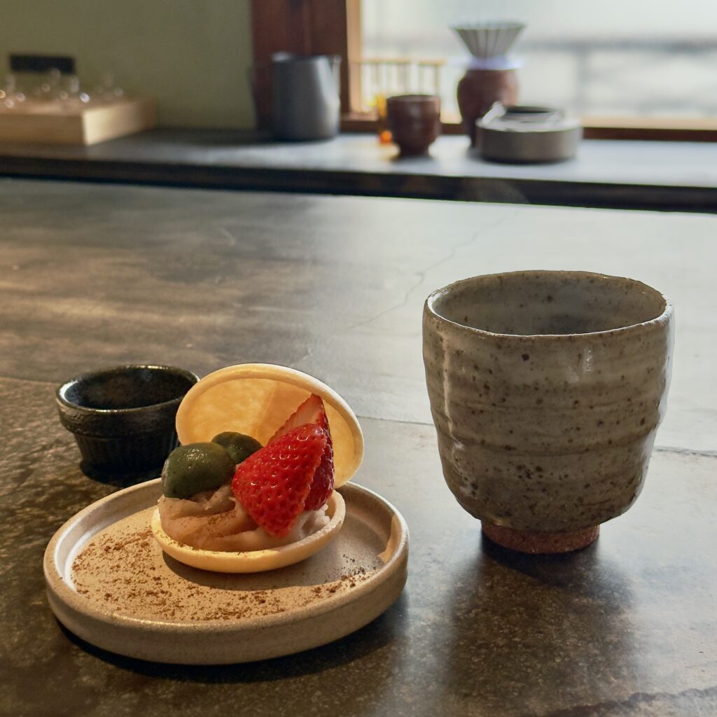 Coffee being brewed at the stone counter inside Fuglen Sangubashi, housed in a renovated traditional Japanese home near Meiji Shrine, Tokyo