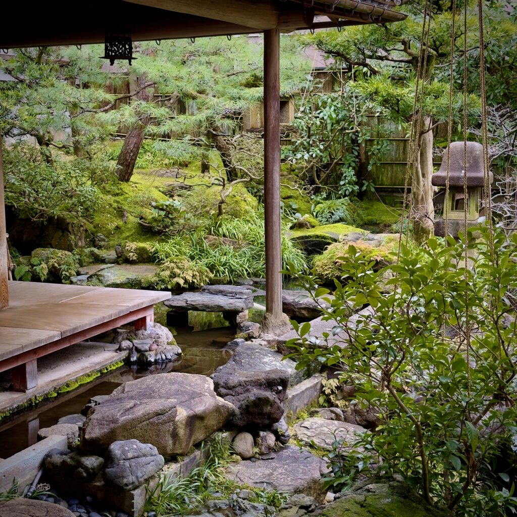 Moss garden and carved ranma transoms inside Nomura-ke samurai residence in Nagamachi district, Kanazawa